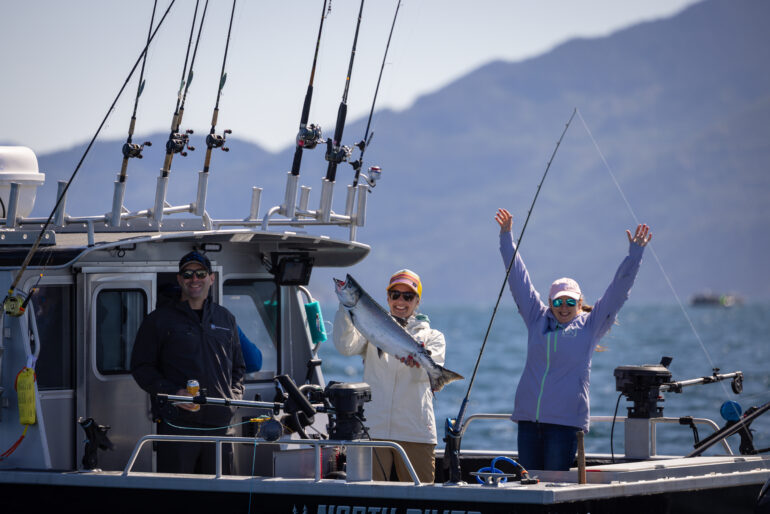 guided fishing group showing their catch